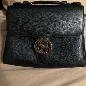 Flawless Black and gold Gucci Marmont bag. Worn literally twice.